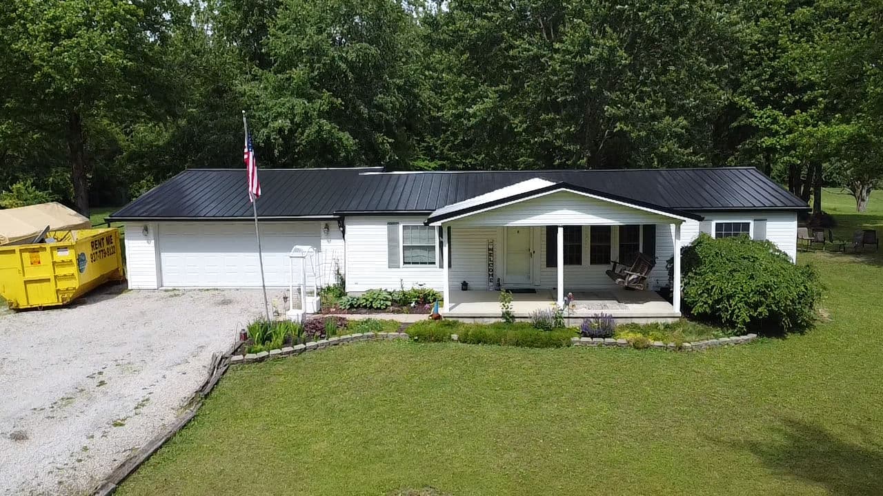 Black Metal Roof and Gutter Upgrade in Mt. Orab image