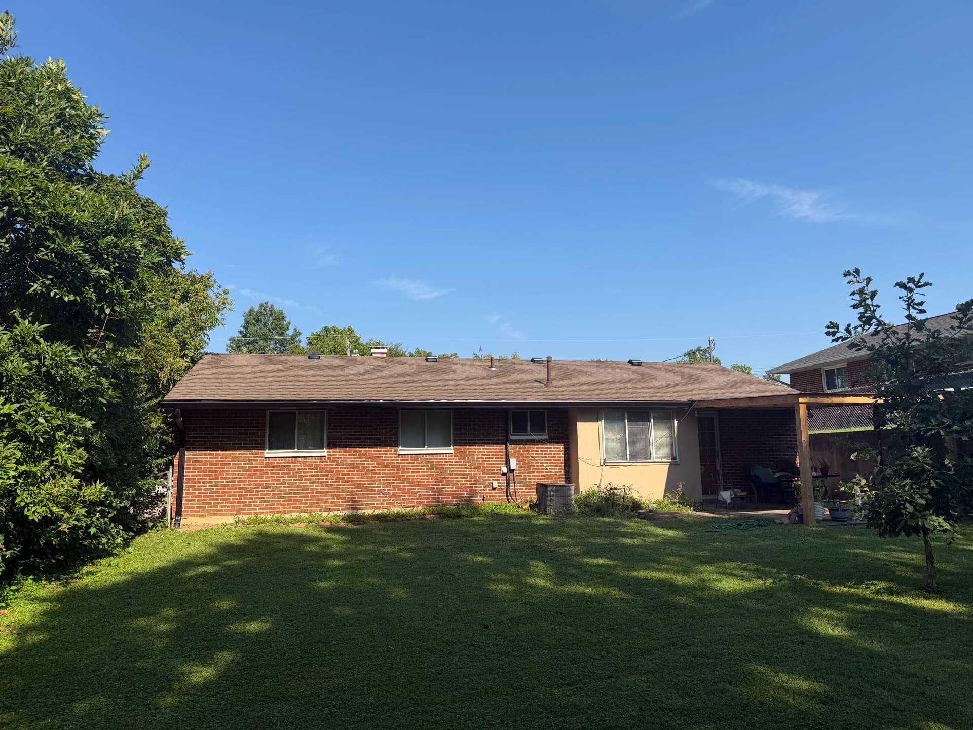 Gallery photos for New Roof and Gutters Fully Dialed In on This Brick Ranch: Image #1