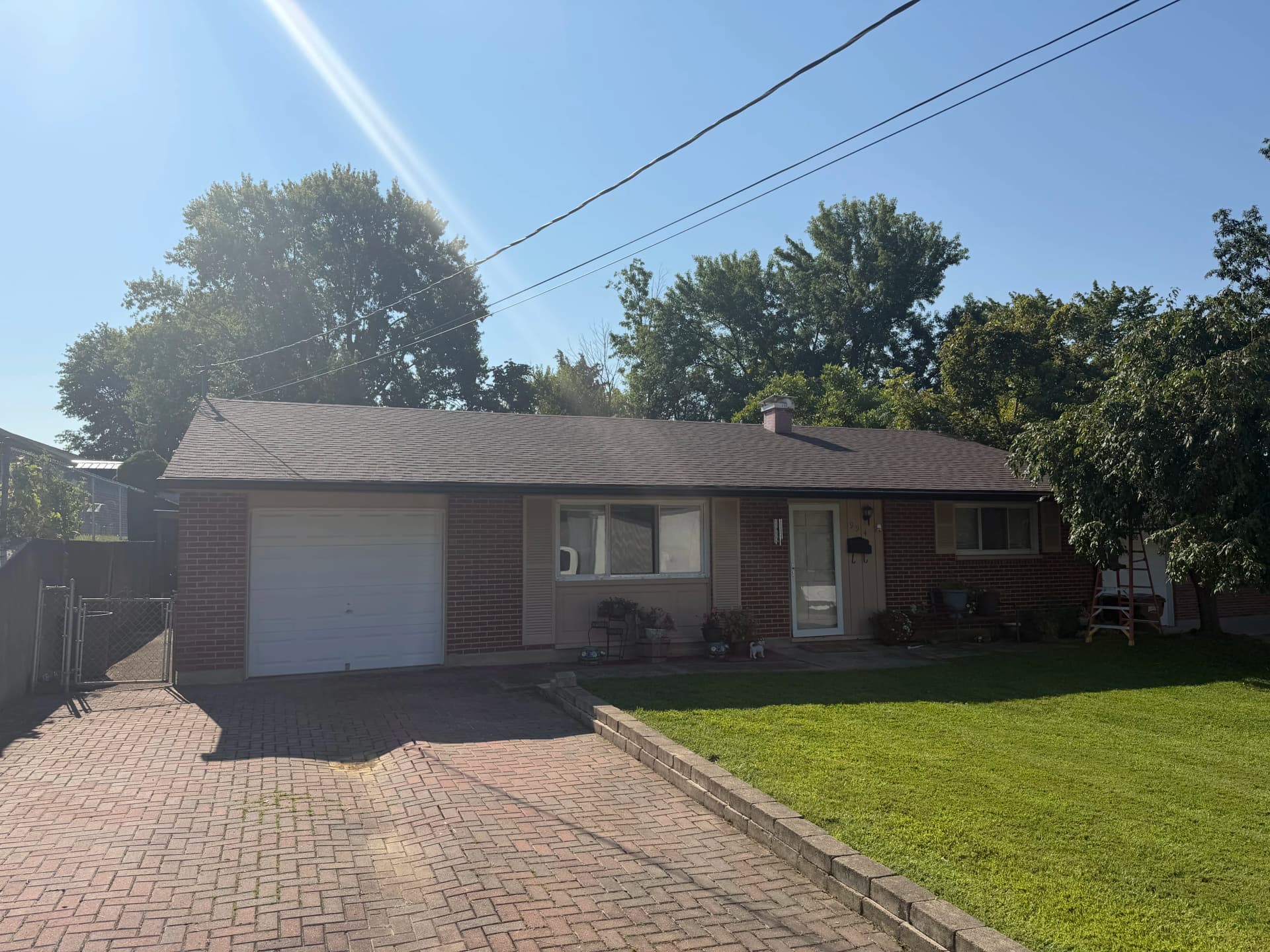New Roof and Gutters Fully Dialed In on This Brick Ranch image