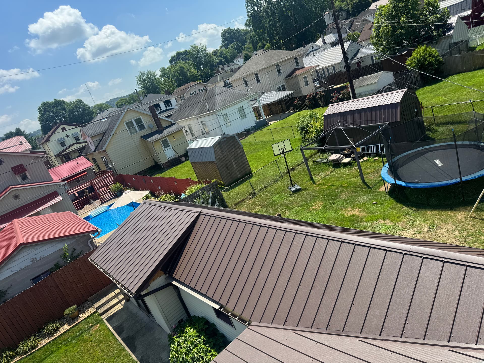 Gallery photos for Quad Rib Metal Roof Installation in Frost Brown: Image #7