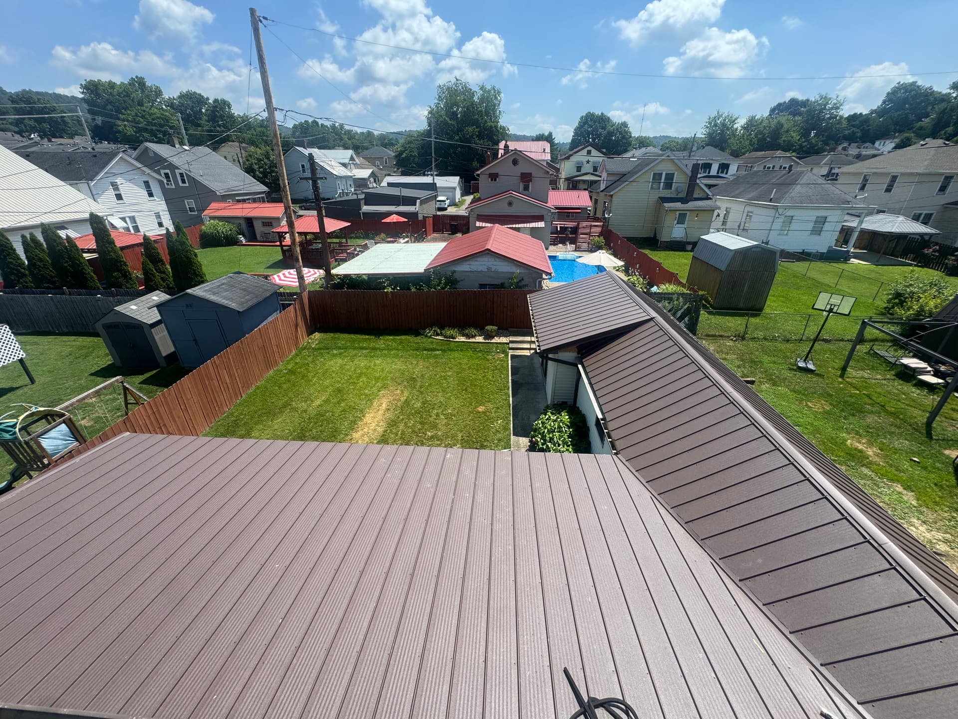 Gallery photos for Quad Rib Metal Roof Installation in Frost Brown: Image #5