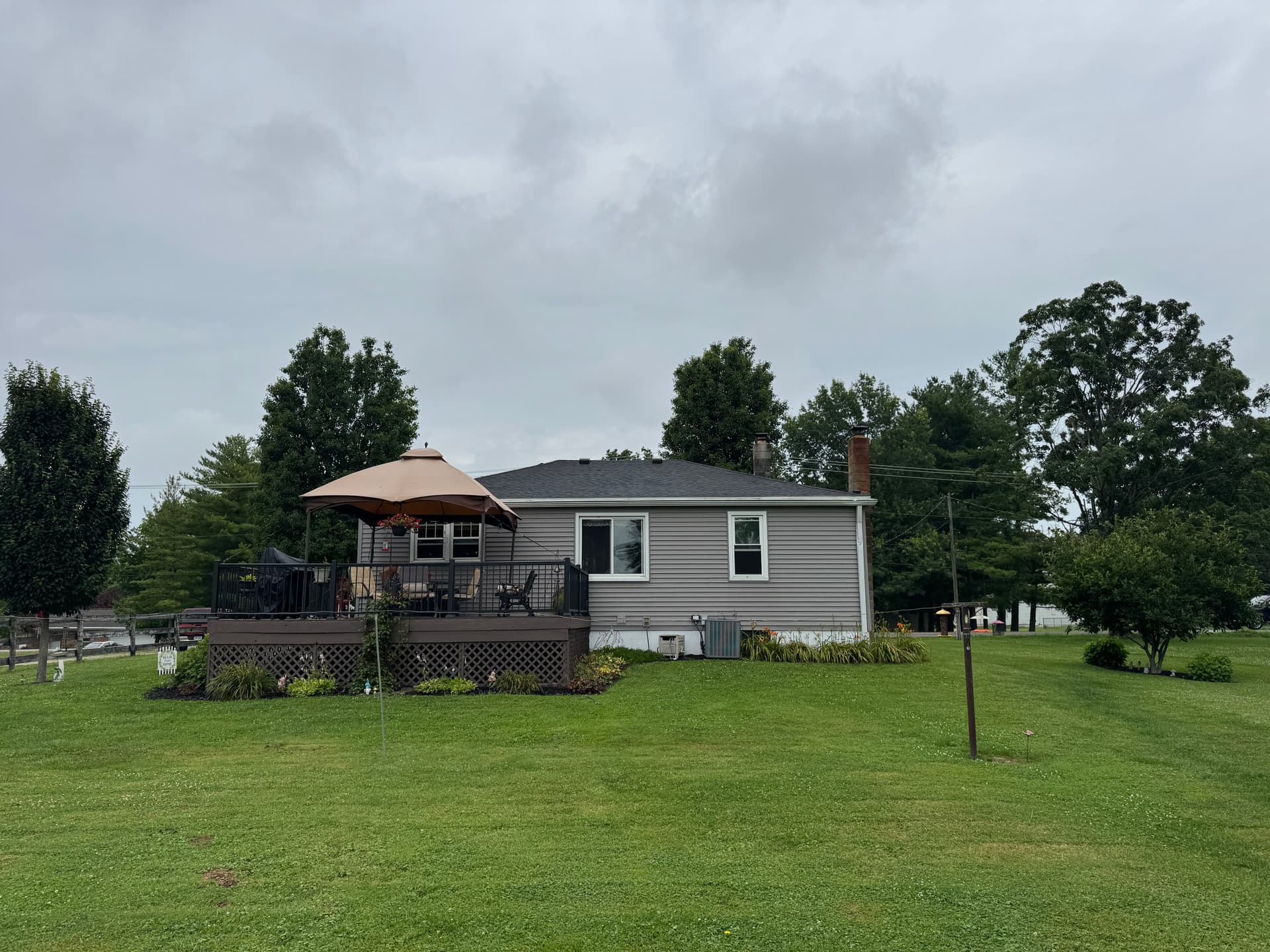 Full Roof Tear-Off and HDZ Charcoal Shingle Replacement image