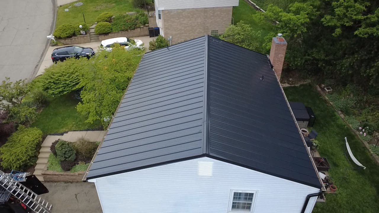 Gallery photos for Standing Seam Metal Roof and Gutter Upgrade on a Classic Two-Story Home: Image #2