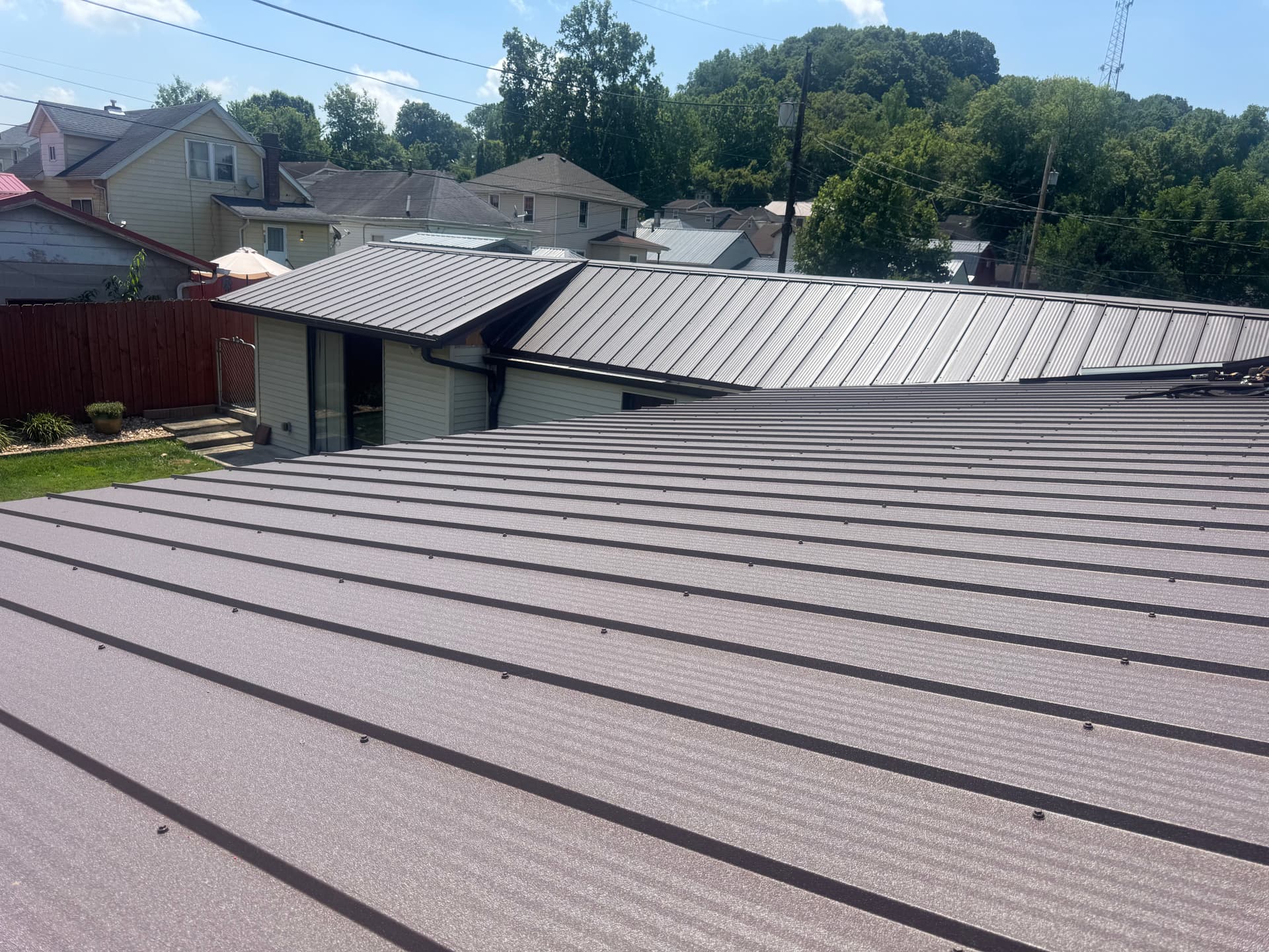 Gallery photos for Quad Rib Metal Roof Installation in Frost Brown: Image #1