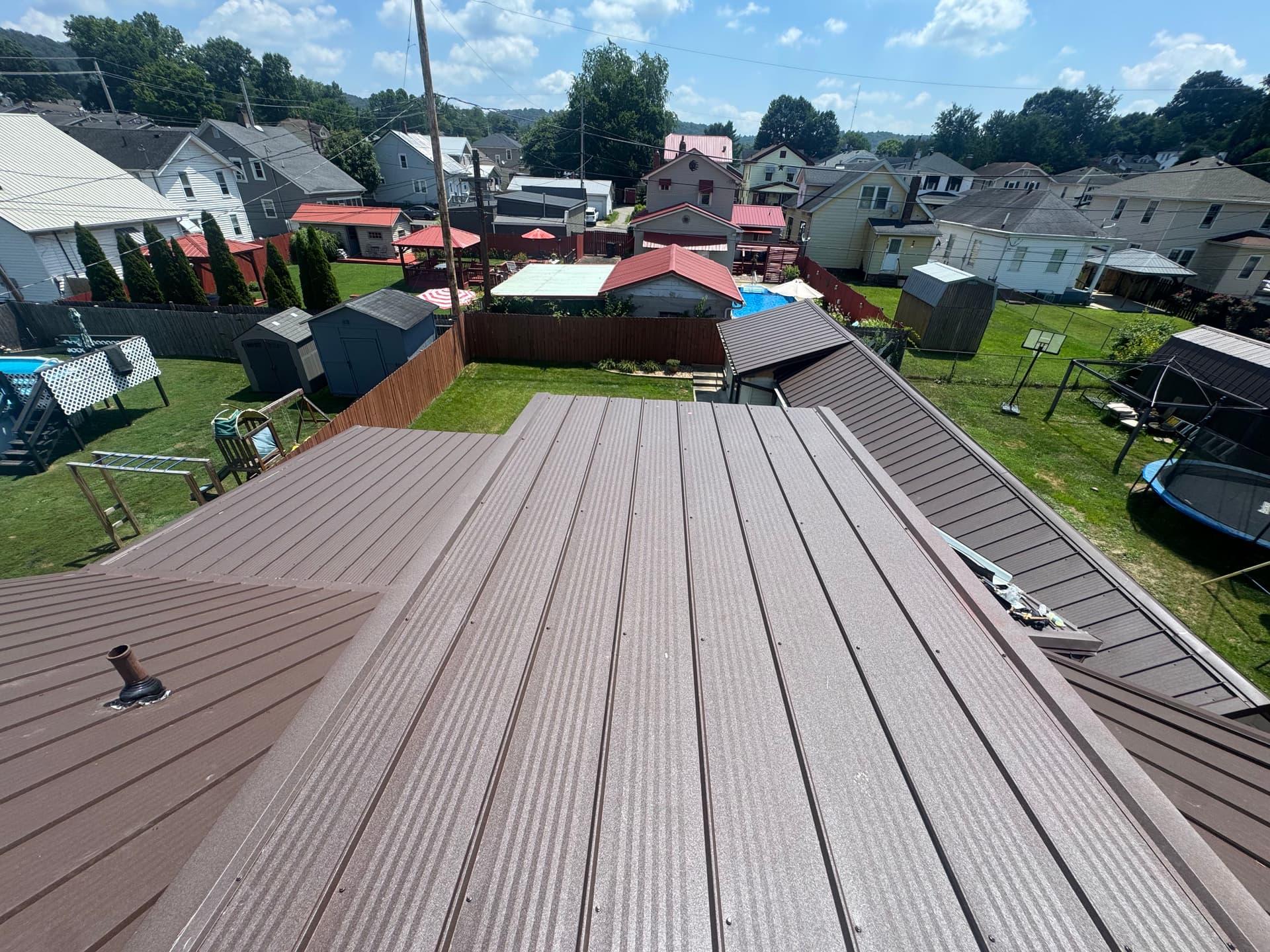 Gallery photos for Quad Rib Metal Roof Installation in Frost Brown: Image #4
