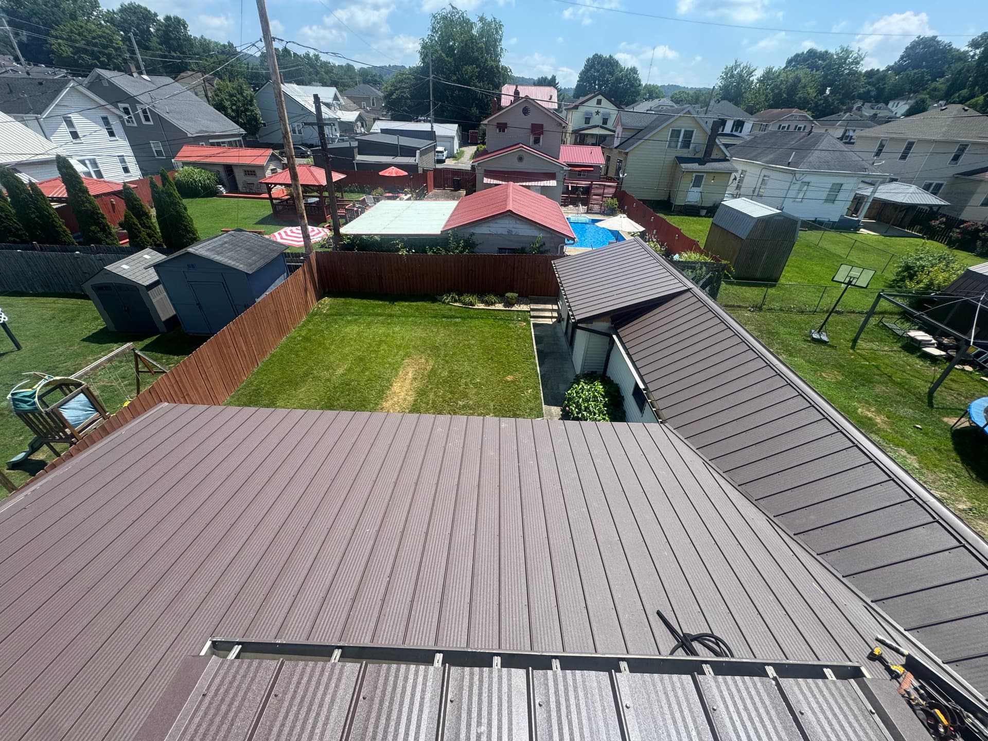 Gallery photos for Quad Rib Metal Roof Installation in Frost Brown: Image #6