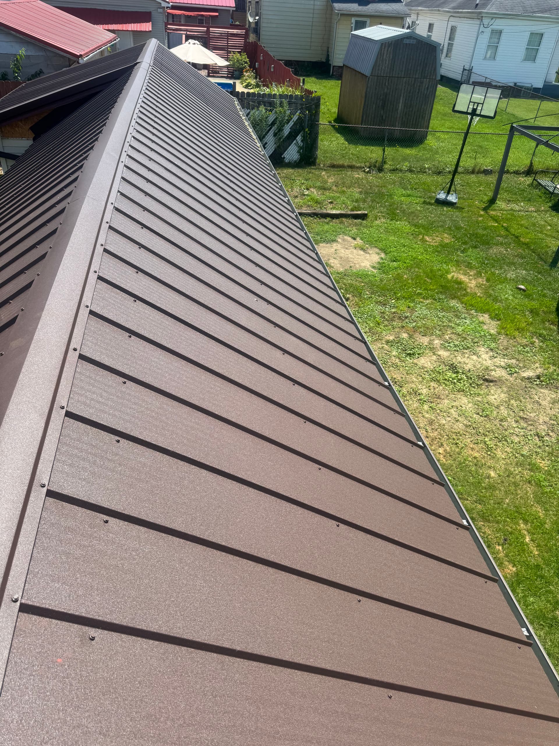 Gallery photos for Quad Rib Metal Roof Installation in Frost Brown: Image #2
